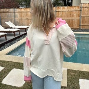 Pink collared sweatshirt